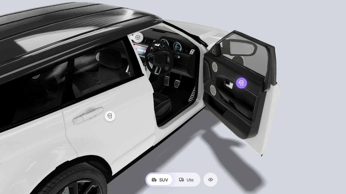 White SUV with open driver door and controls